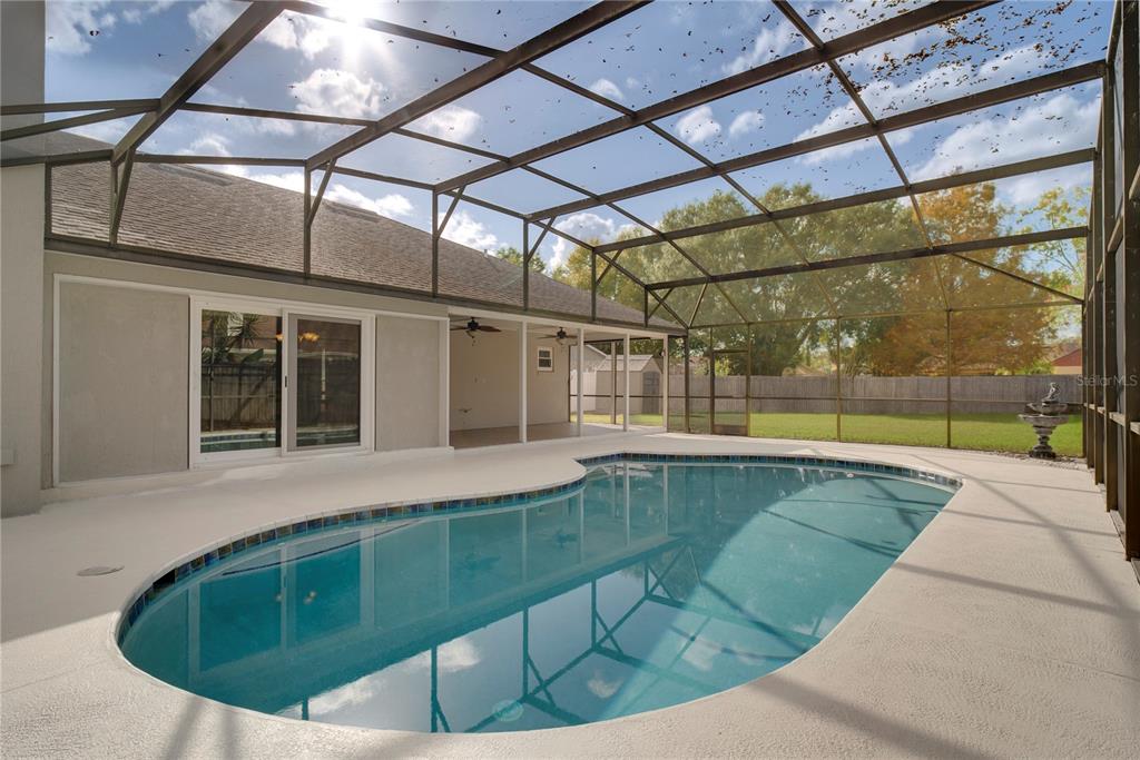 1504 East Spring Ridge Circle Winter Garden, FL 34787 - Photo 19 of 21 a view of a house with a swimming pool