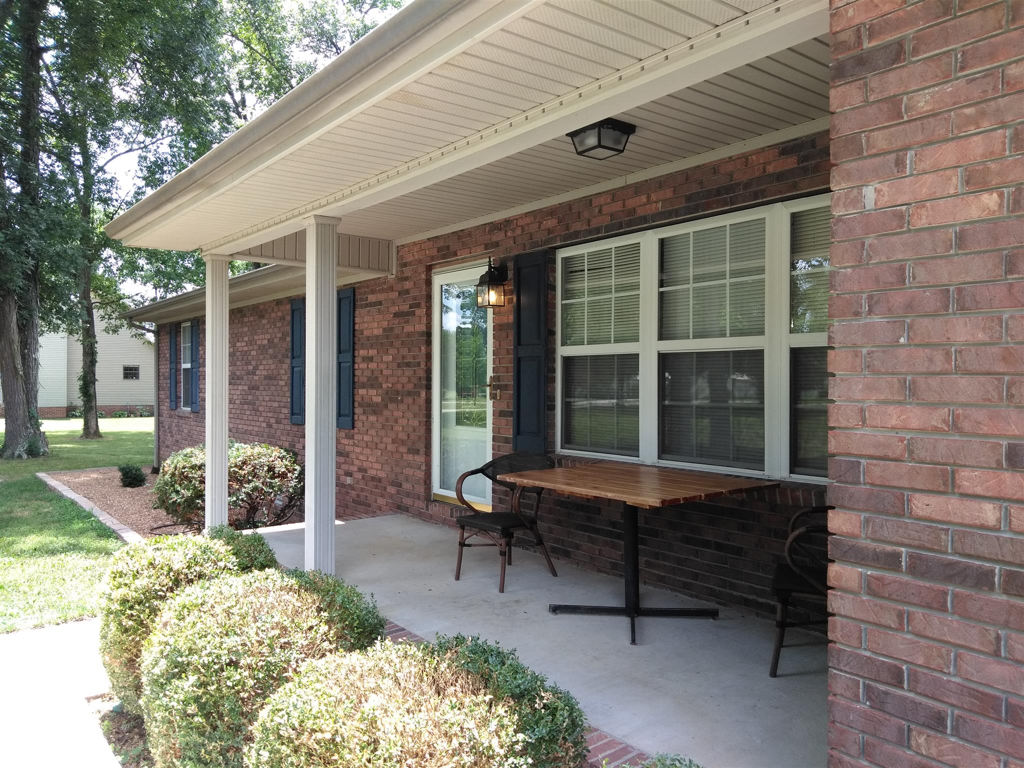 204 Deer Point Road Unionville, TN 37180 - Photo 1 of 26 Nice front porch with spot for rocking chairs