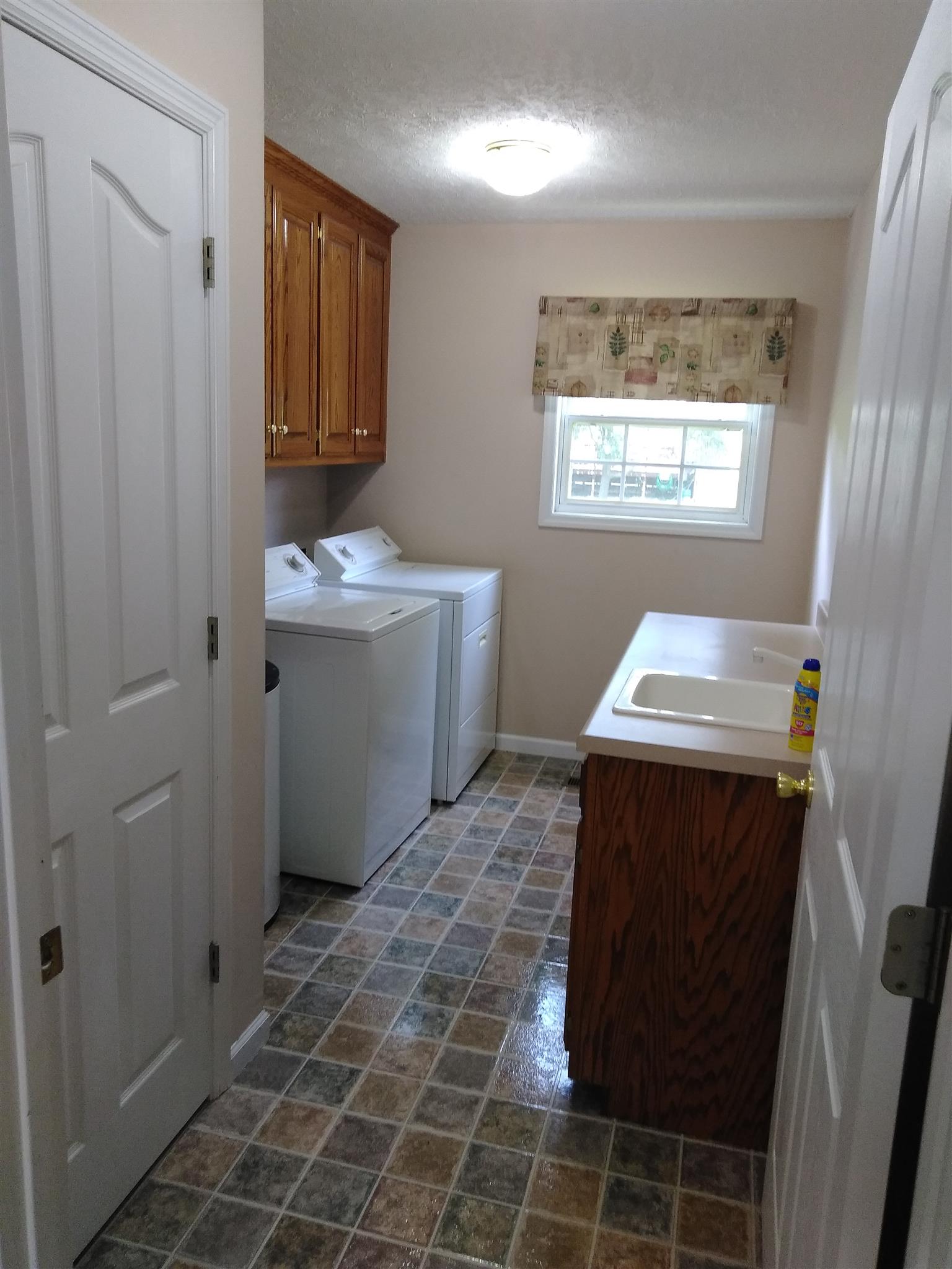 204 Deer Point Road Unionville, TN 37180 - Photo 16 of 26 Huge utility room! Washer and dryer to stay.