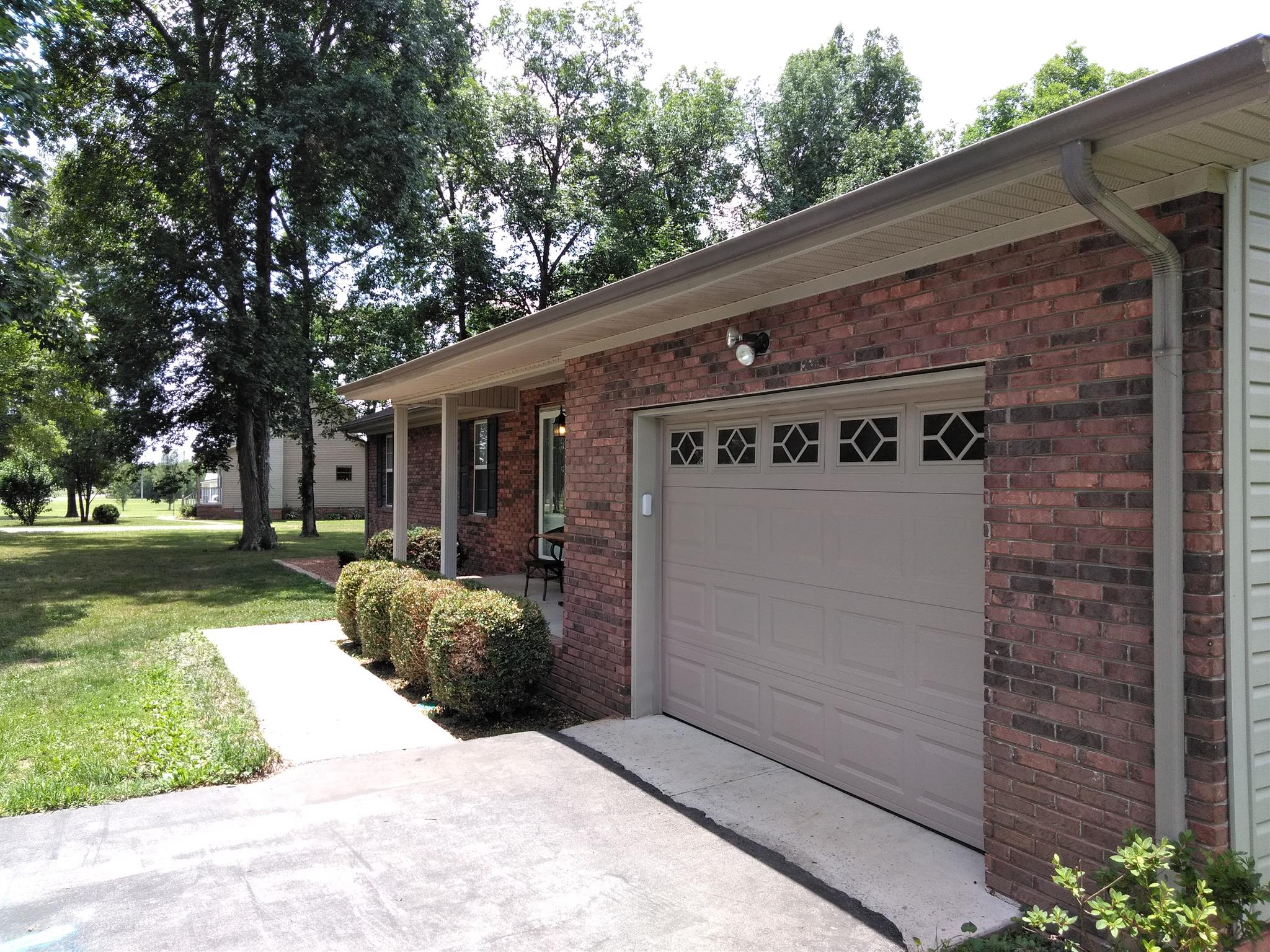204 Deer Point Road Unionville, TN 37180 - Photo 4 of 26 Paved drive runs into attached garage