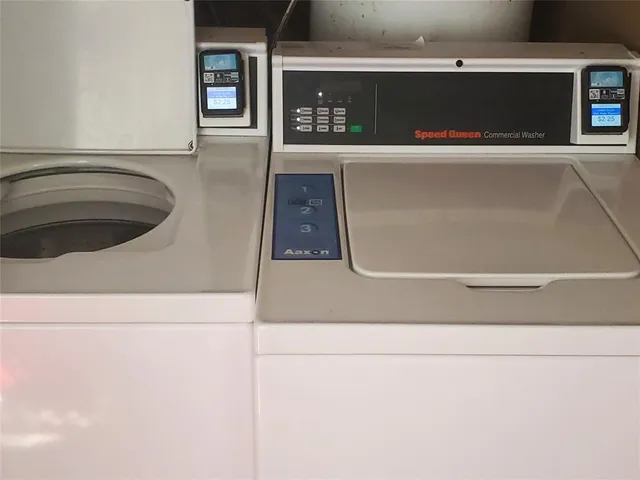 a view of street with parked cars