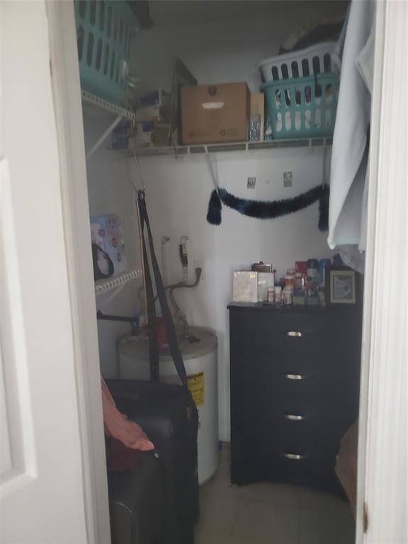 1021 Northeast 24th Avenue, Unit 4 Pompano Beach, FL 33062 - Photo 10 of 21 a bathroom with a sink and a mirror