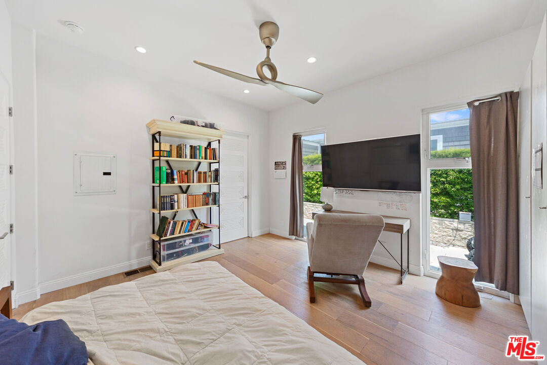 29500 Heathercliff Road, Unit 184 Malibu, CA 90265 - Photo 21 of 46 a living room with furniture and a flat screen tv