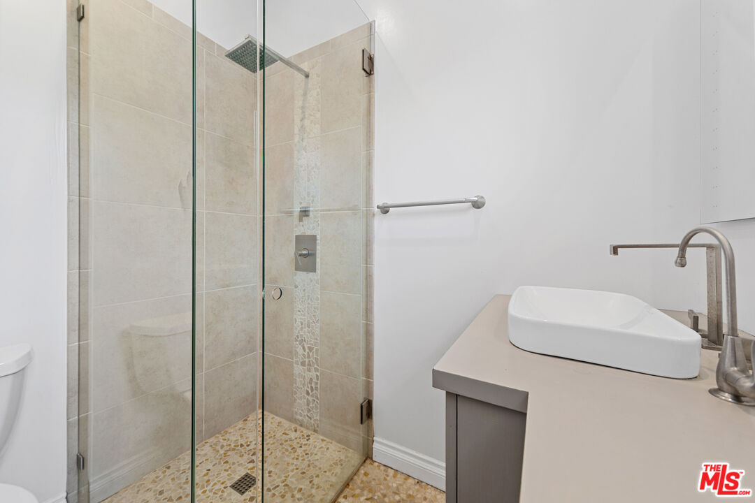29500 Heathercliff Road, Unit 184 Malibu, CA 90265 - Photo 23 of 46 a bathroom with a shower
