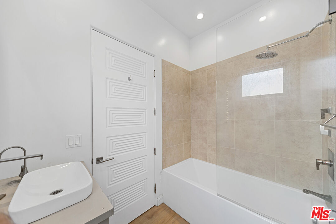 29500 Heathercliff Road, Unit 184 Malibu, CA 90265 - Photo 27 of 46 a bathroom with a tub and a sink