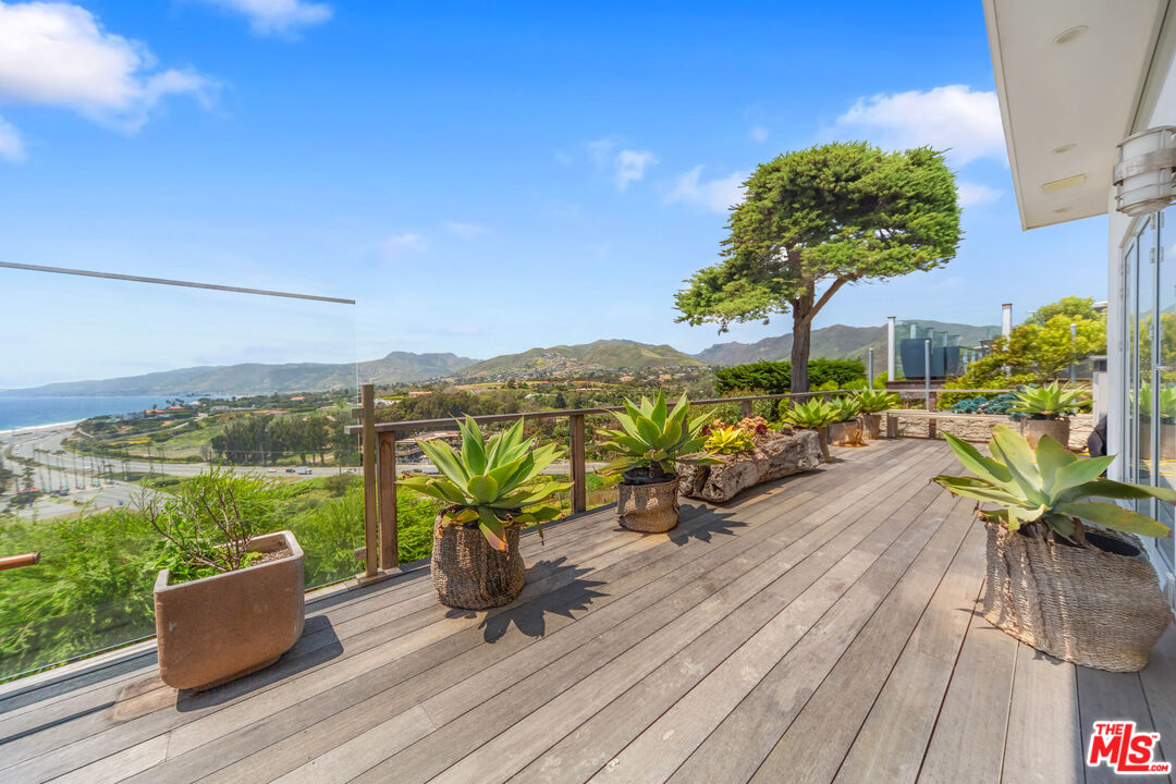 29500 Heathercliff Road, Unit 184 Malibu, CA 90265 - Photo 28 of 46 a view of a terrace with furniture