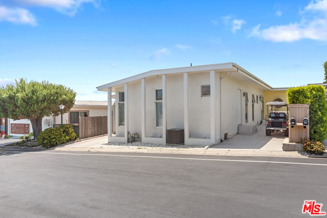 29500 Heathercliff Road, Unit 184 Malibu, CA 90265 - Photo 31 of 46 a front view of a house with a garage