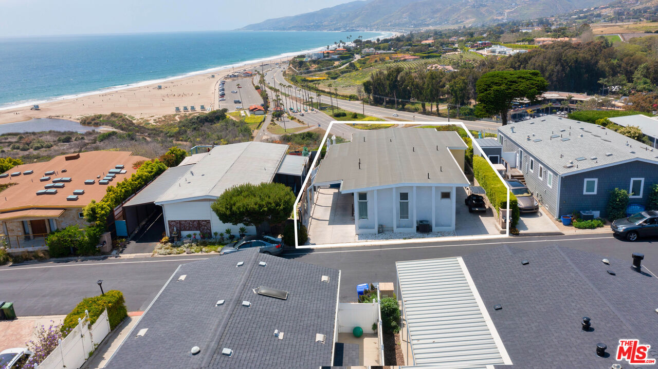 29500 Heathercliff Road, Unit 184 Malibu, CA 90265 - Photo 35 of 46 an aerial view of multiple houses with a yard