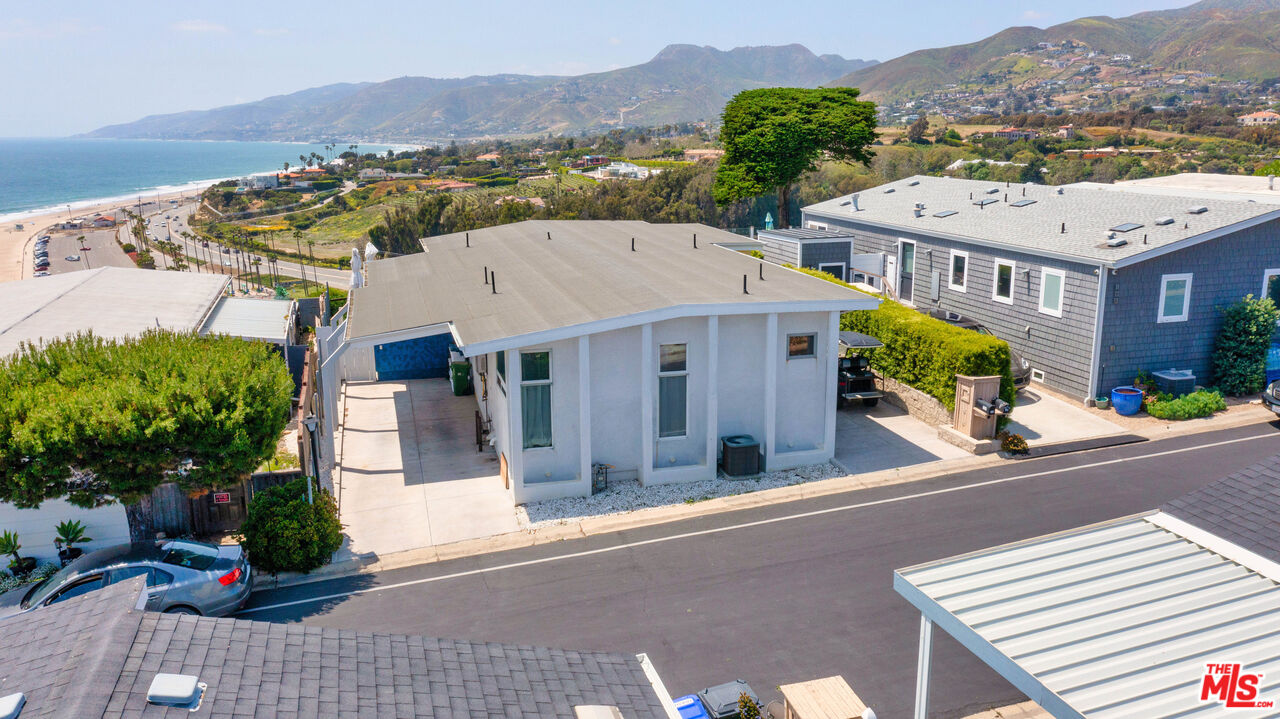 29500 Heathercliff Road, Unit 184 Malibu, CA 90265 - Photo 36 of 46 an aerial view of houses with a street