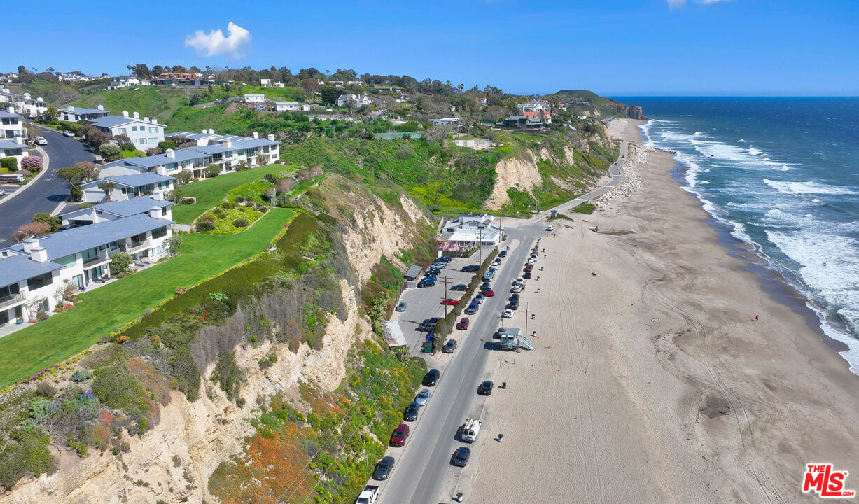 29500 Heathercliff Road, Unit 184 Malibu, CA 90265 - Photo 43 of 46 a view of a yard with an ocean