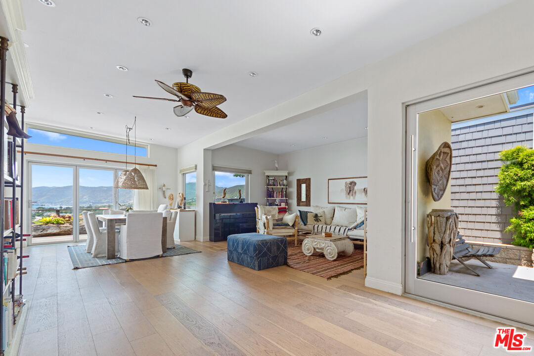 29500 Heathercliff Road, Unit 184 Malibu, CA 90265 - Photo 5 of 46 a living room with furniture and kitchen view