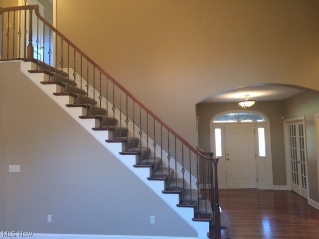 4410 Spruce Run Akron, OH 44321 - Photo 11 of 21 Stairs with iron balustrades. Foyer on right