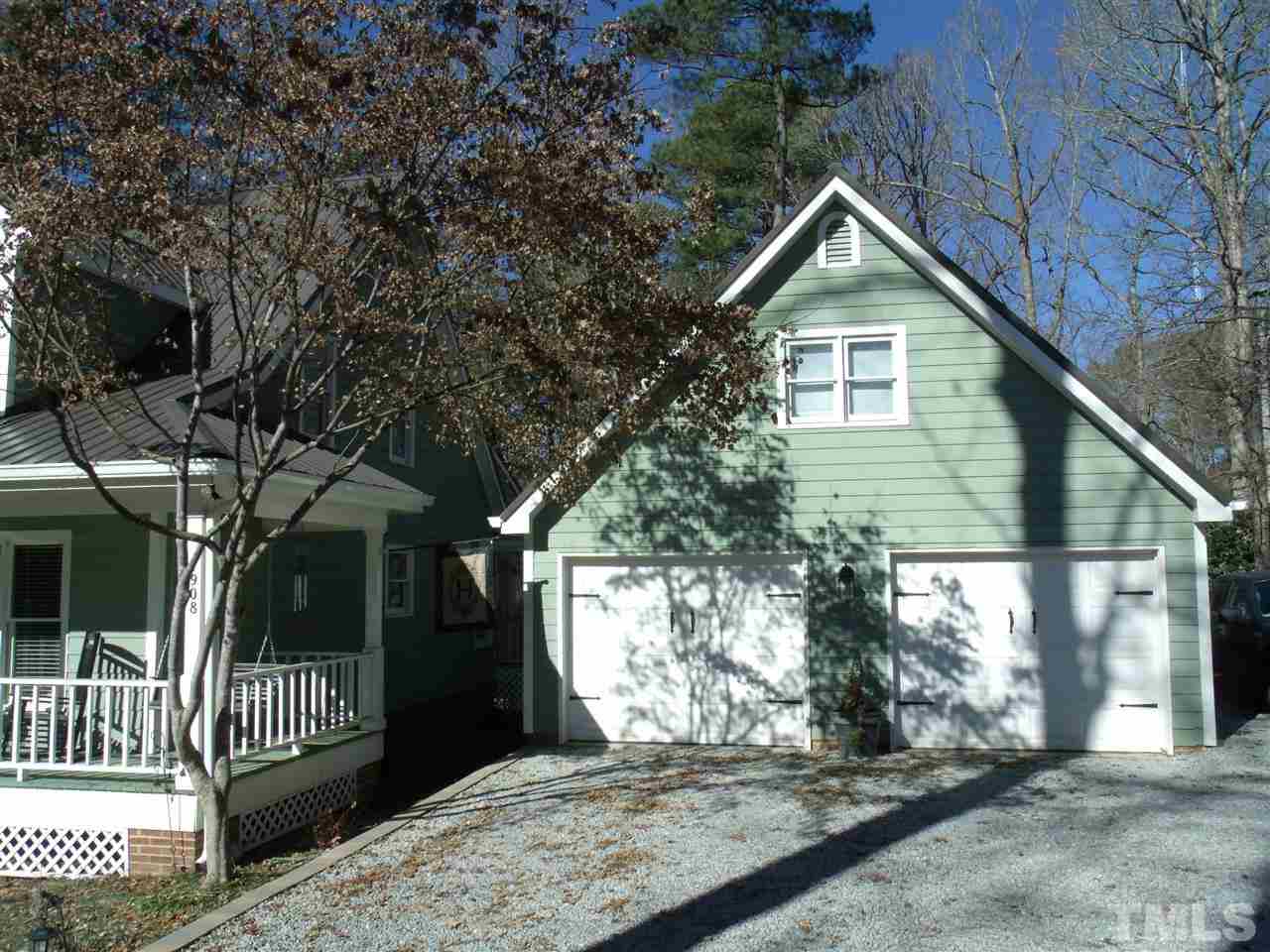 7908 Senter Farm Road Apex, NC 27539 - Photo 3 of 25 Detached garage offers rear entry way and 309 sq feet room above garage