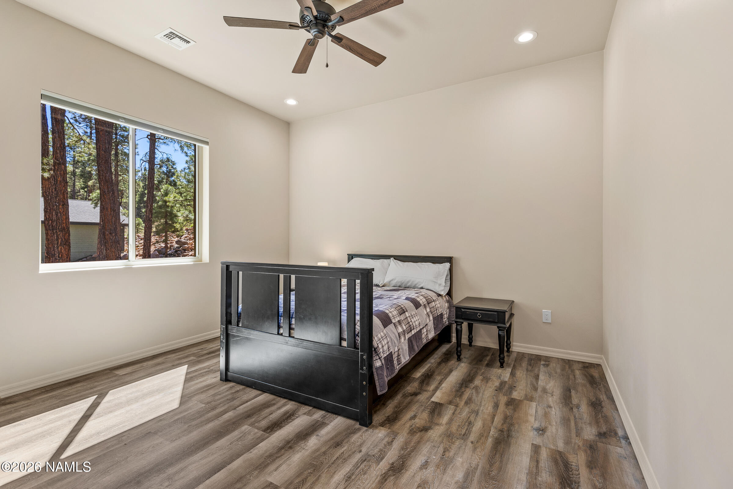 1093 Redwall Way Williams, AZ 86046 - Photo 28 of 70 a bed room with a bed and a window