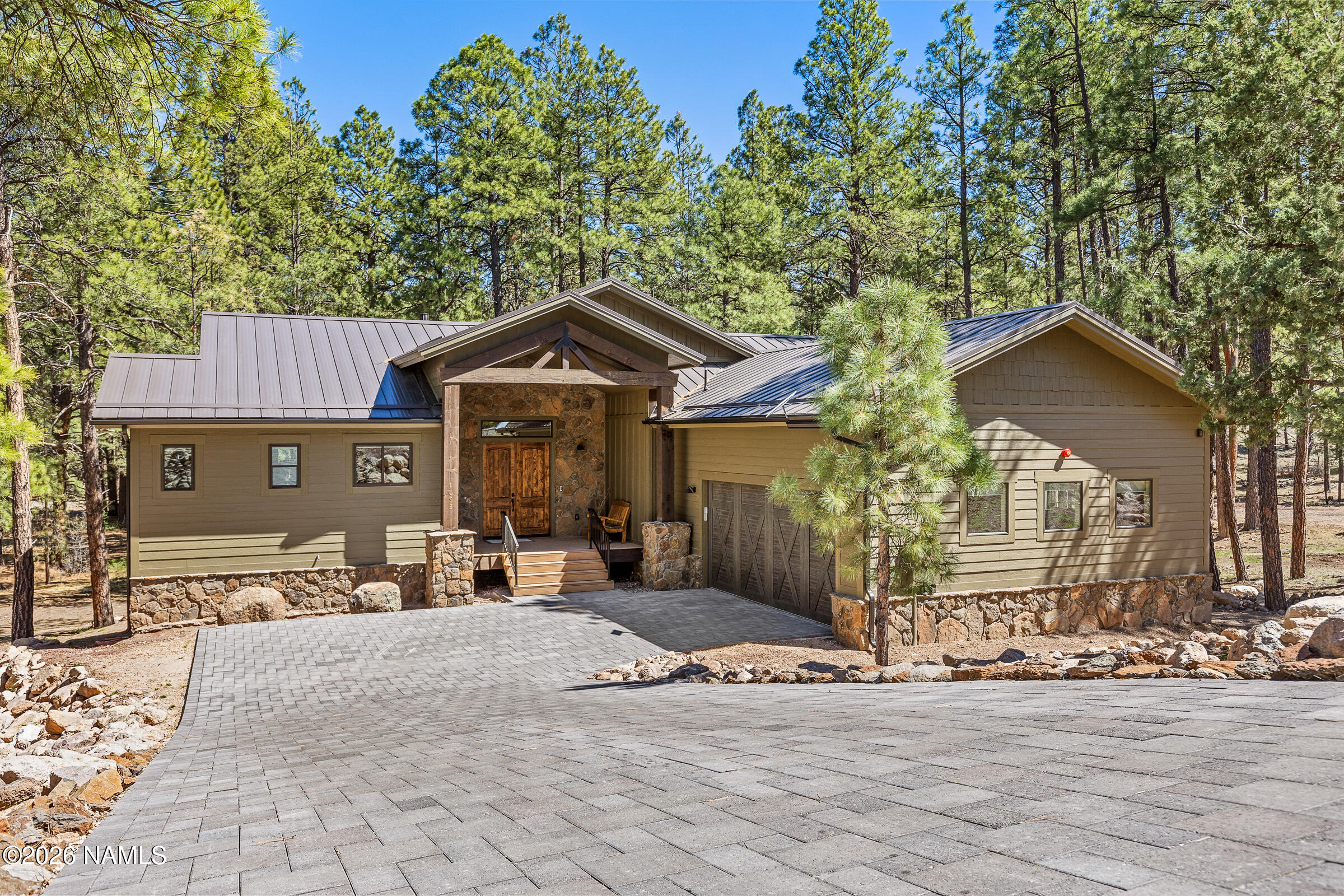1093 Redwall Way Williams, AZ 86046 - Photo 3 of 70 a front view of a house with a yard outdoor seating and barbeque oven