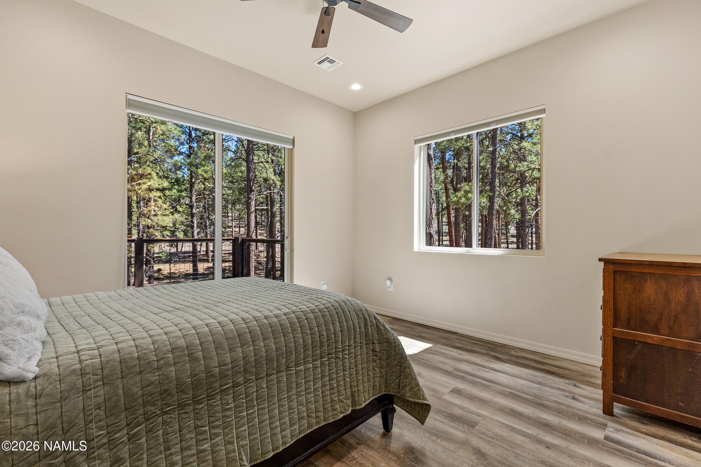 1093 Redwall Way Williams, AZ 86046 - Photo 32 of 70 a bedroom with a bed and a window