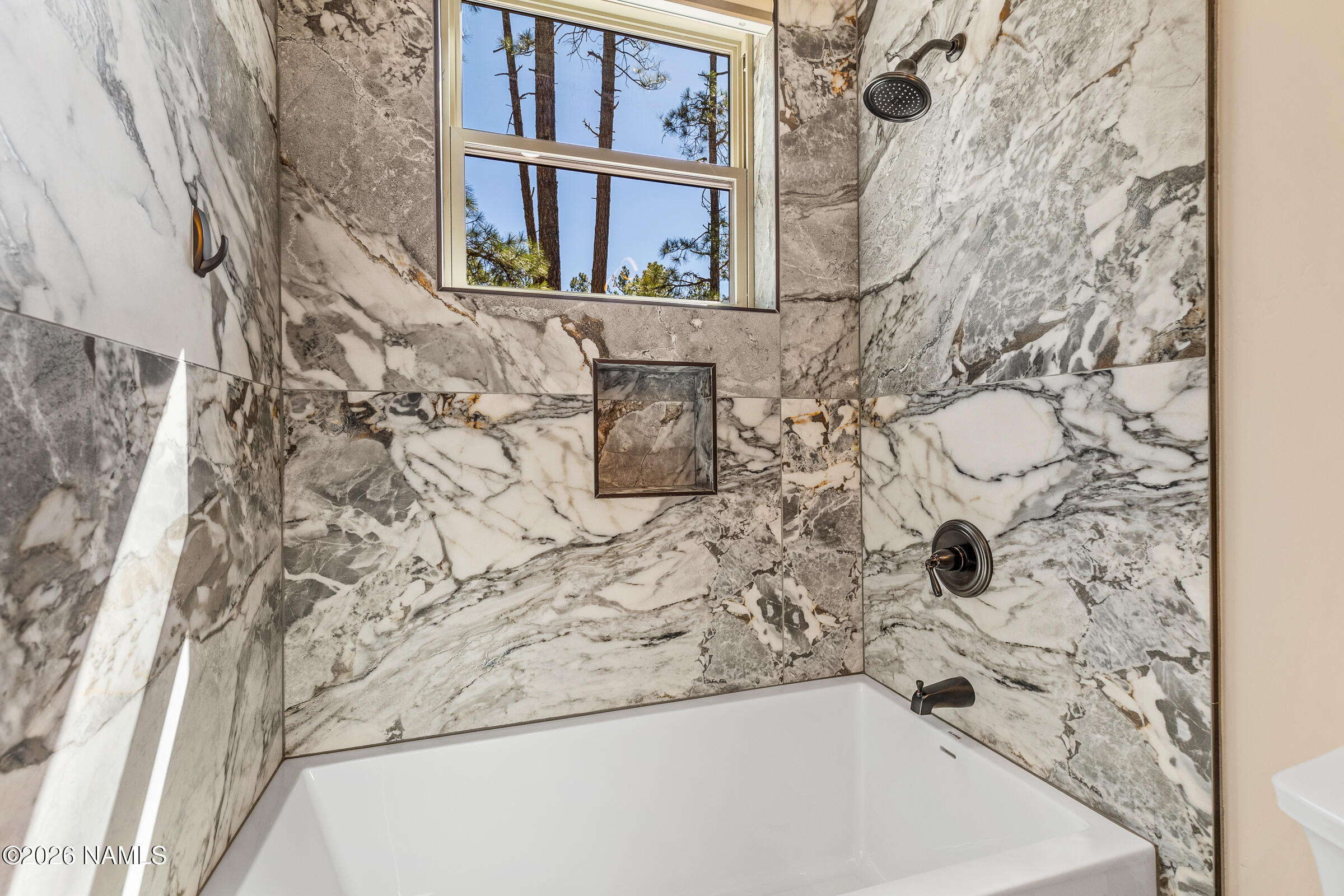 1093 Redwall Way Williams, AZ 86046 - Photo 35 of 70 a bathroom with a bathtub and shower