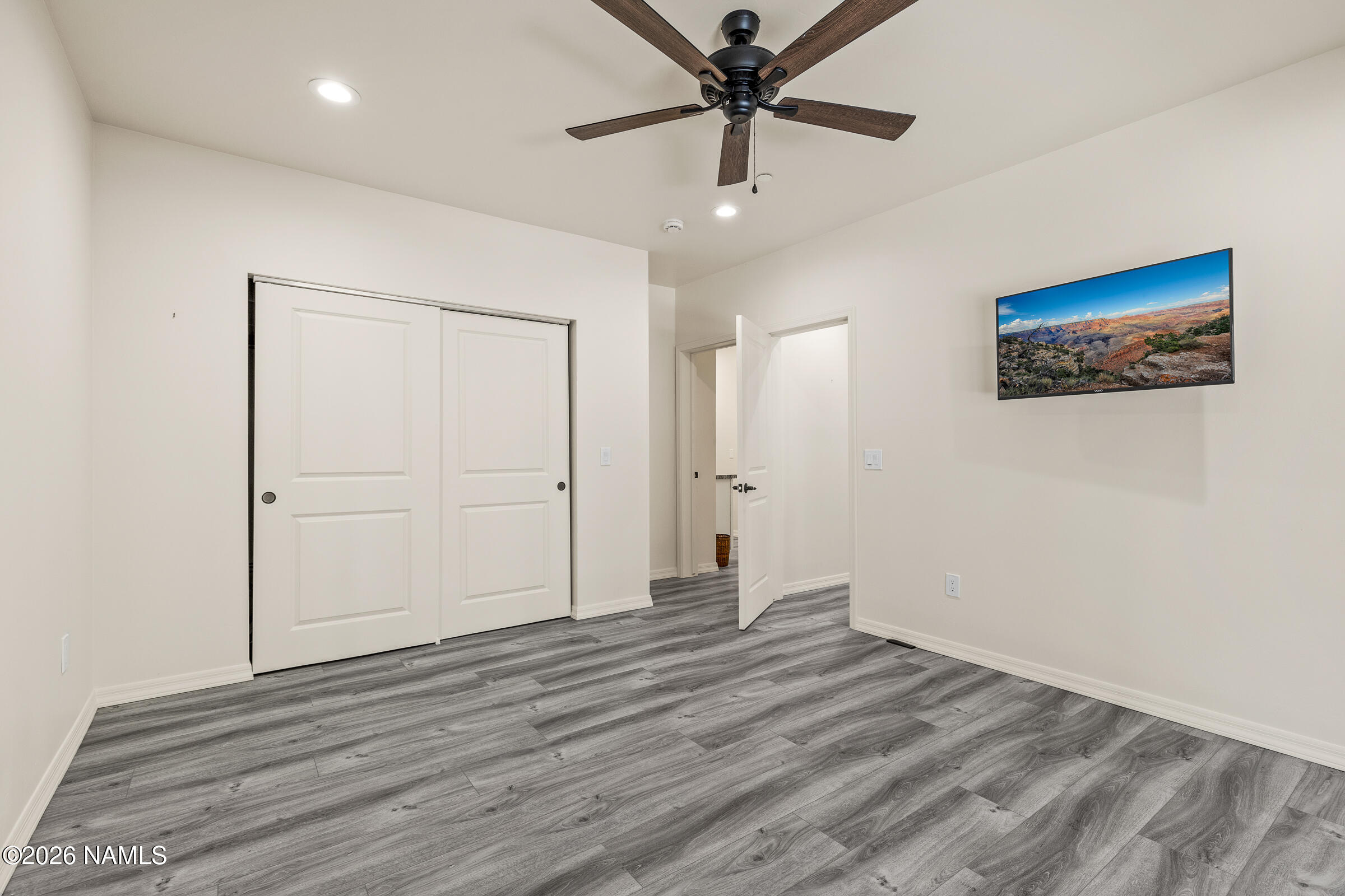 1093 Redwall Way Williams, AZ 86046 - Photo 45 of 70 wooden floor in an empty room