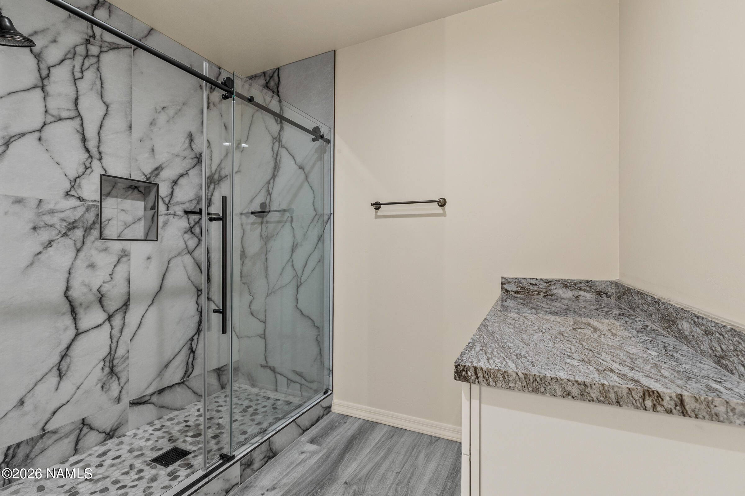 1093 Redwall Way Williams, AZ 86046 - Photo 47 of 70 a bathroom with a granite countertop sink and shower