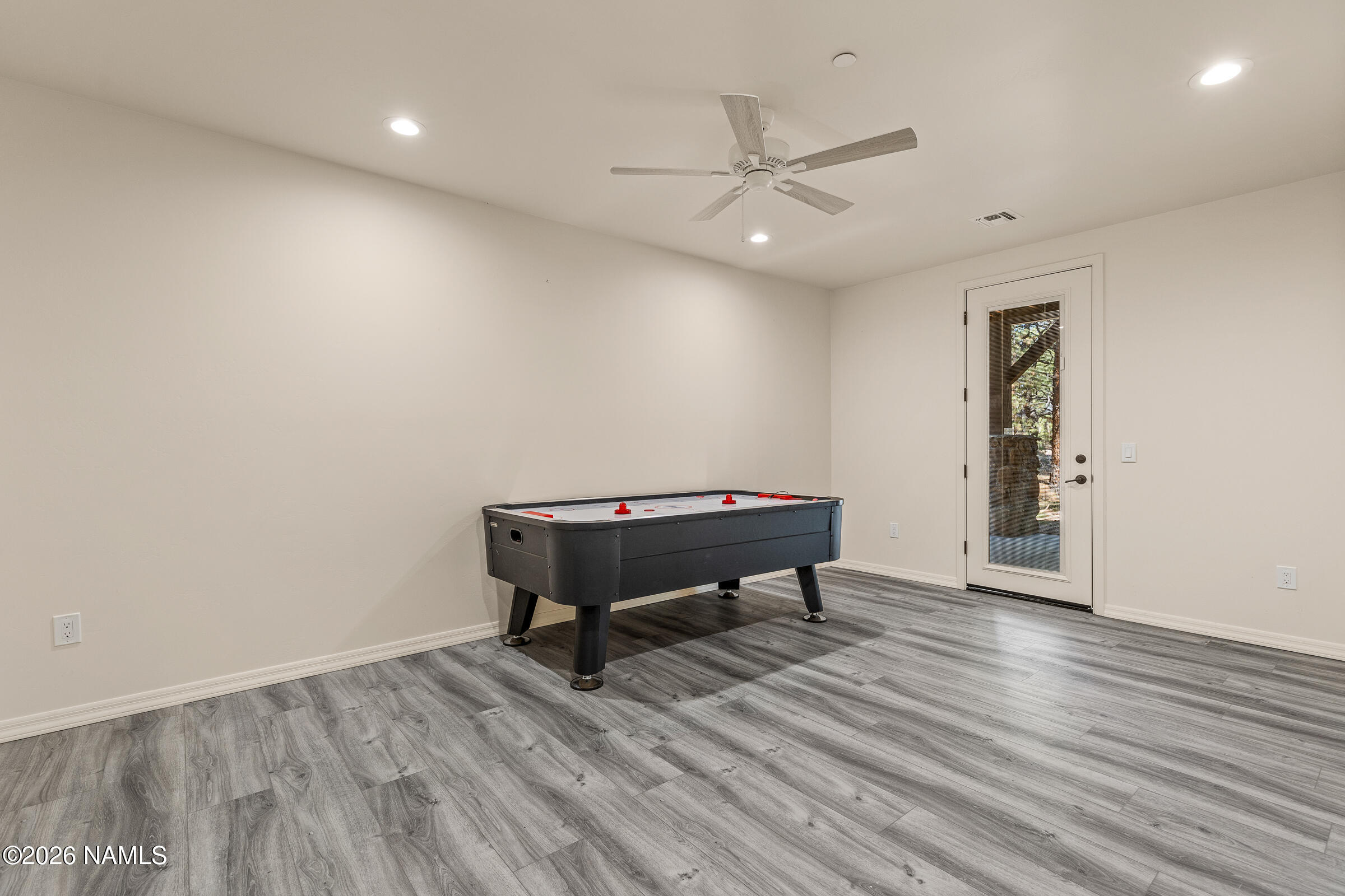 1093 Redwall Way Williams, AZ 86046 - Photo 49 of 70 a room with wooden floor and pool table