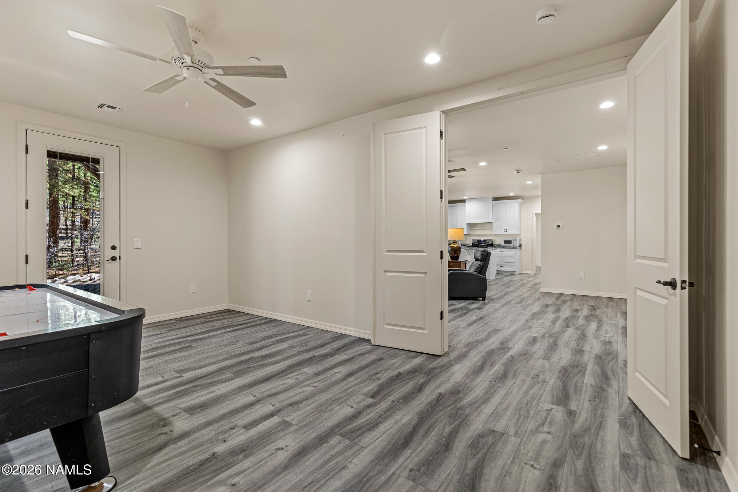1093 Redwall Way Williams, AZ 86046 - Photo 50 of 70 a view of a kitchen with a sink and wooden floor