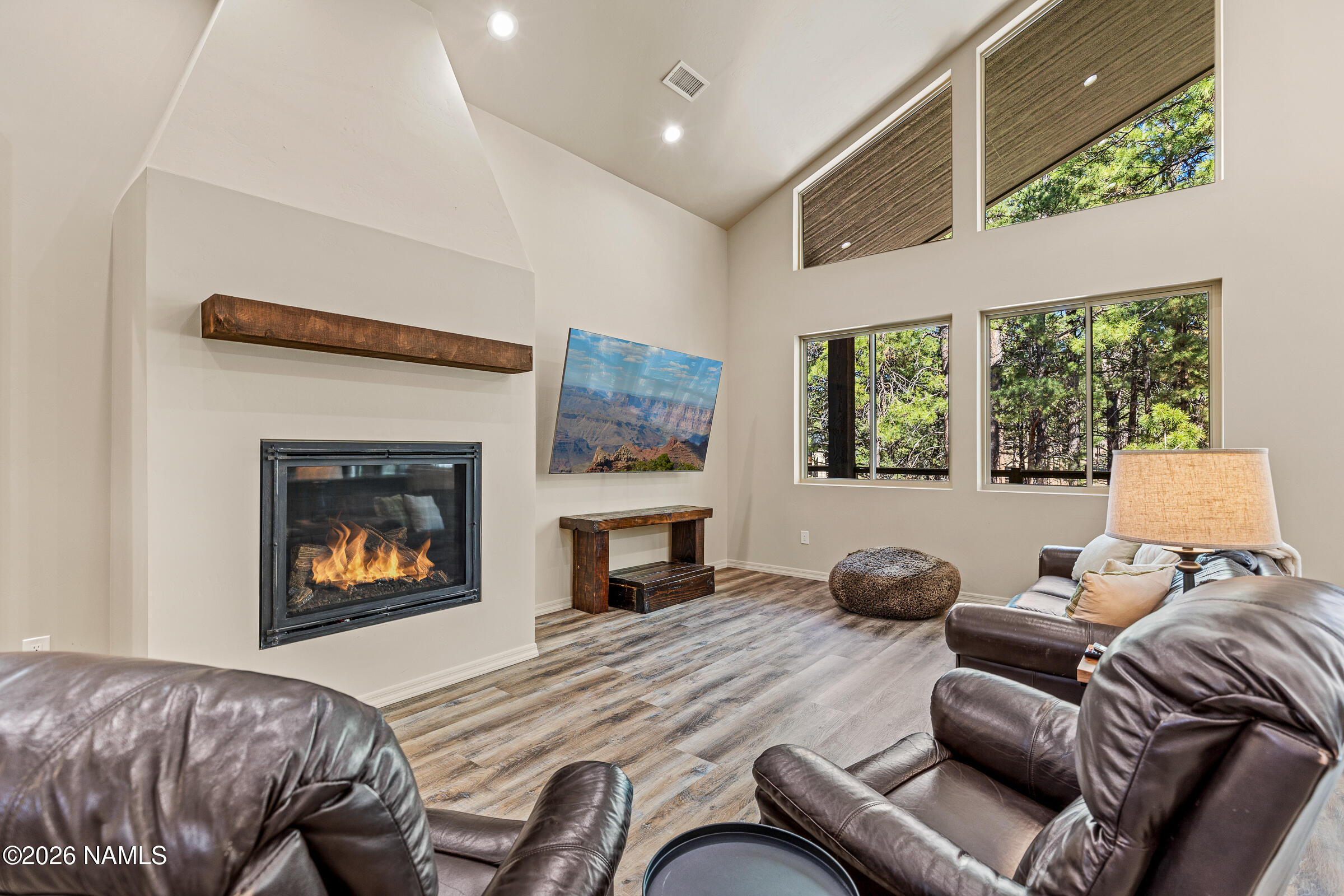 1093 Redwall Way Williams, AZ 86046 - Photo 6 of 70 a bedroom with a bed and a fireplace