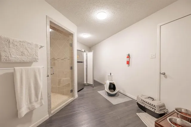 a view of a livingroom with wooden floor
