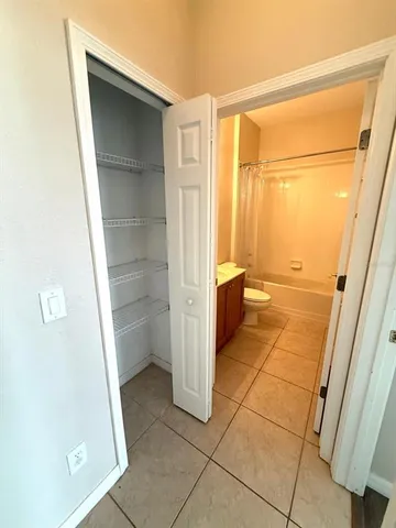 a view of a kitchen with a sink
