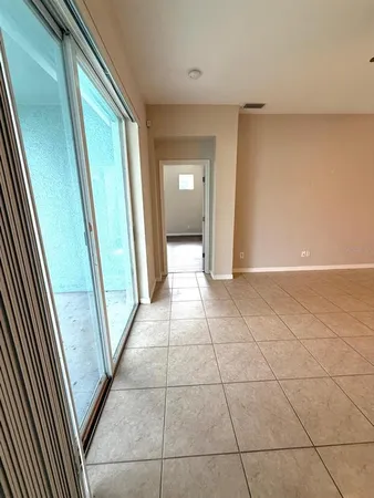 a view of a livingroom and a kitchen