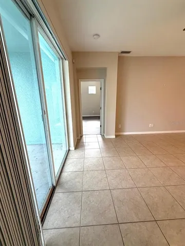 a view of a livingroom and a kitchen