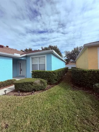 a house view with a garden space