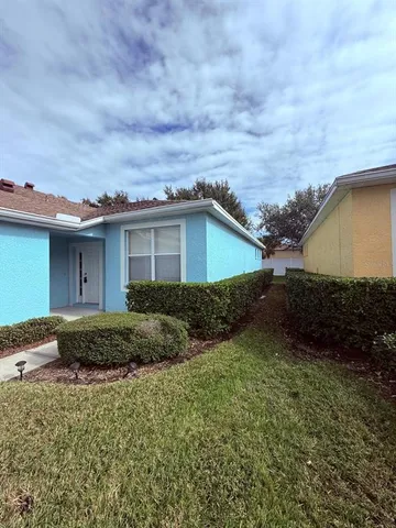 a house view with a garden space