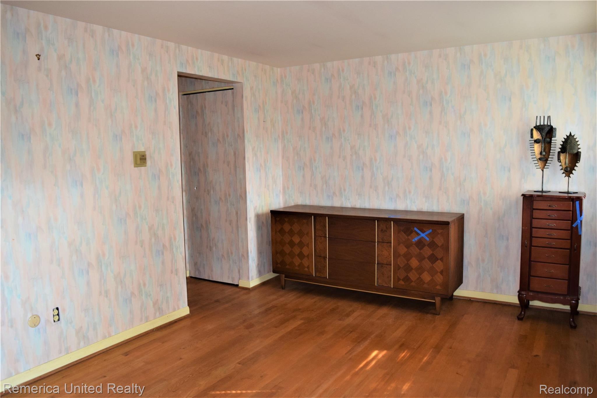 30069 Barwell Road Farmington, MI 48334 - Photo 16 of 34 HIS AND HER CLOSETS IN THE 2ND FLOOR MASTER.