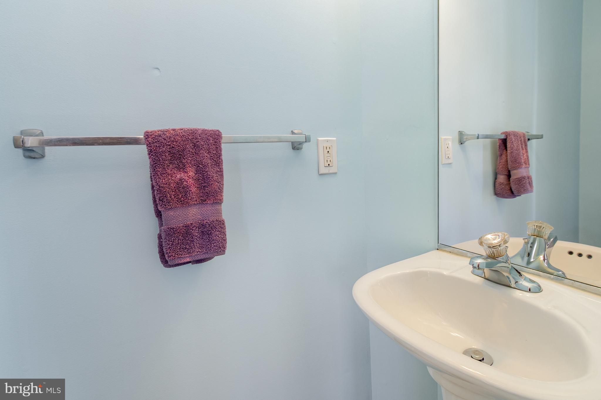 124 Maple Leaf Drive Rising Sun, MD 21911 - Photo 22 of 46 a bathroom with a sink and a mirror