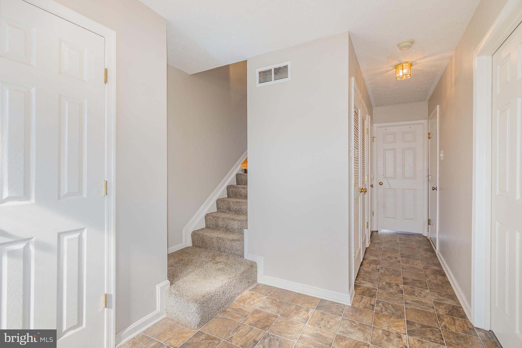 124 Maple Leaf Drive Rising Sun, MD 21911 - Photo 23 of 46 a view of a hallway with wooden floor and entryway
