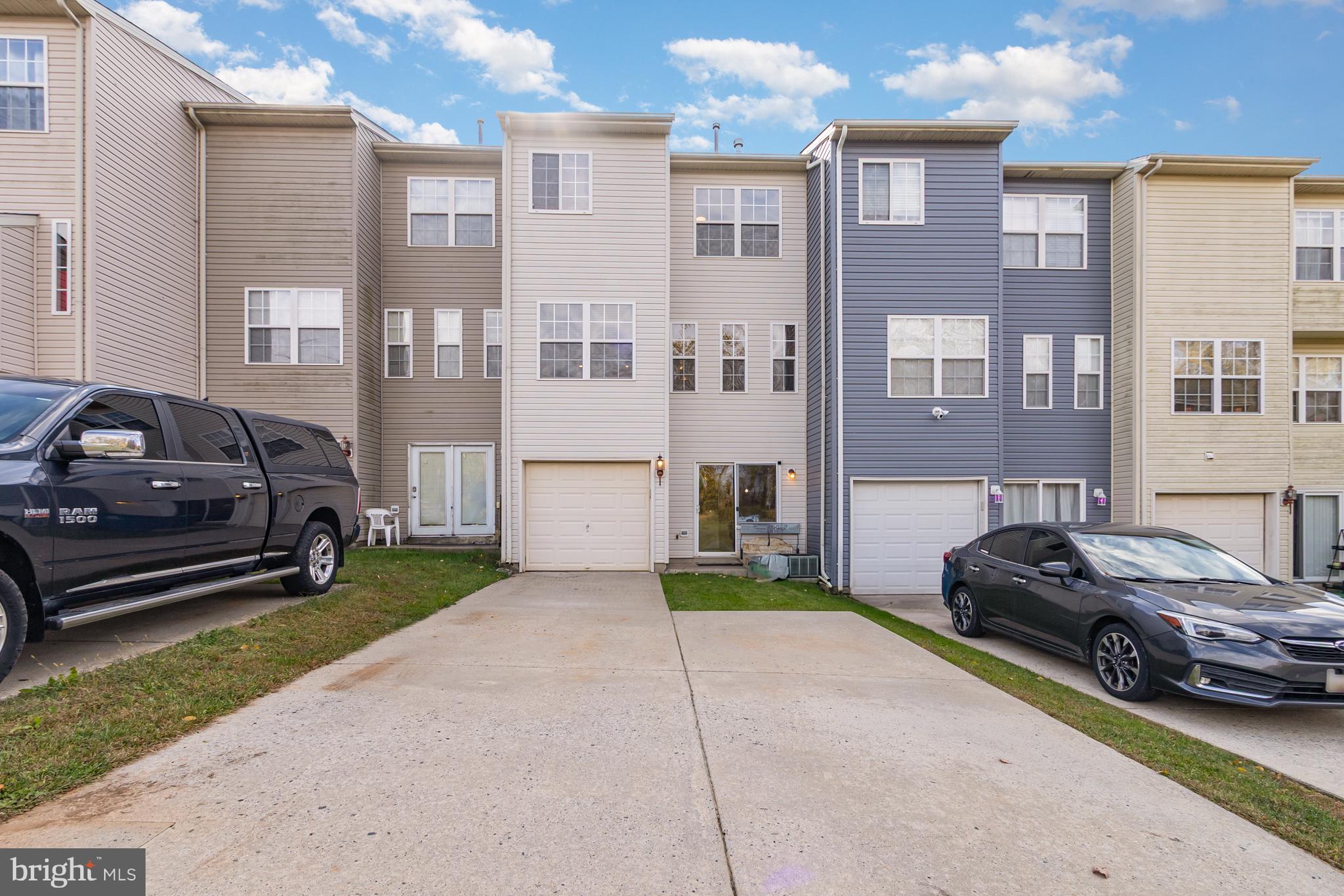 124 Maple Leaf Drive Rising Sun, MD 21911 - Photo 37 of 46 a car parked in front of a brick house