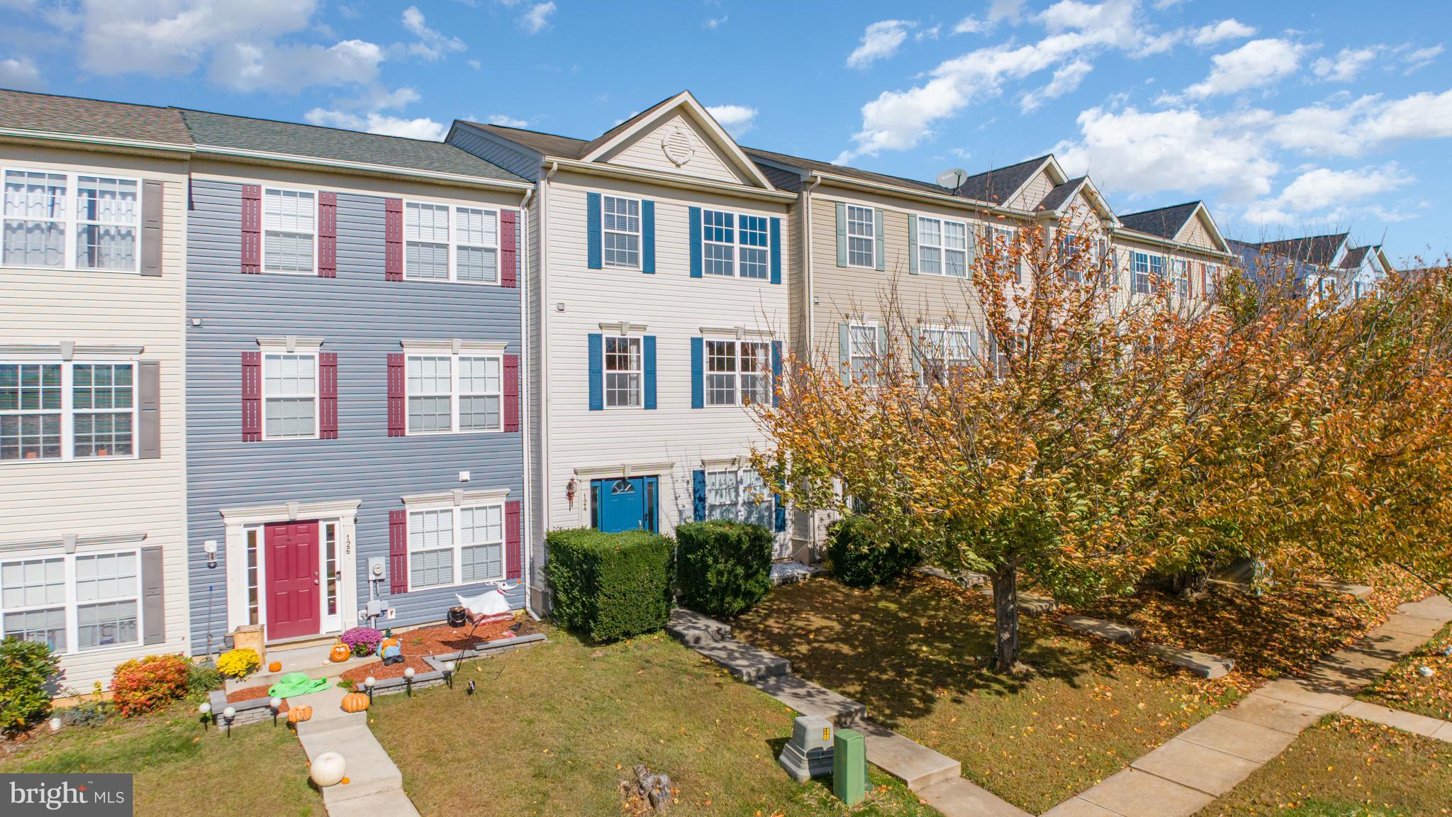 124 Maple Leaf Drive Rising Sun, MD 21911 - Photo 4 of 46 a front view of a house with a yard