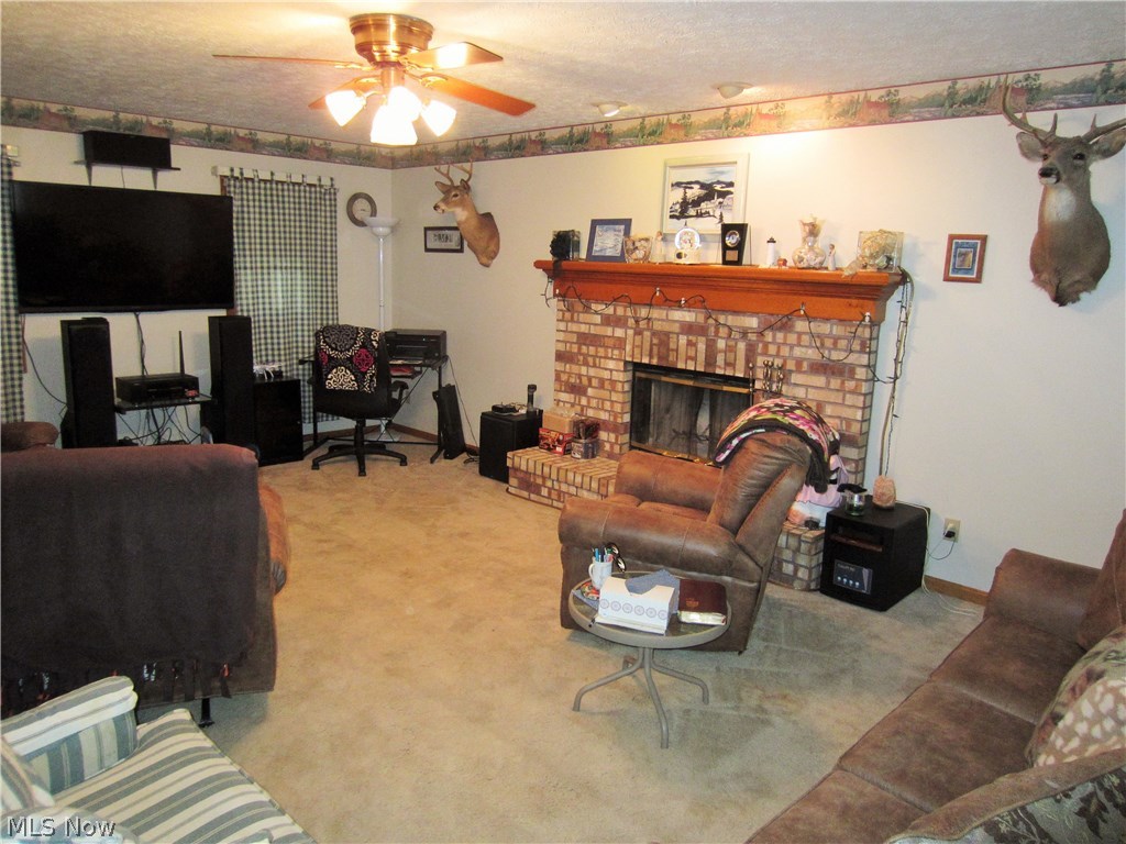 24021 Foster Road Litchfield, OH 44253 - Photo 5 of 34 Great room is a fantastic space for gatherings.