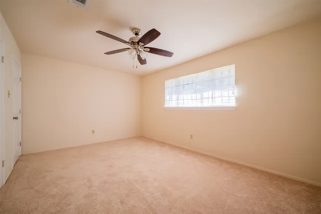 a bathroom with a sink a mirror and a shower
