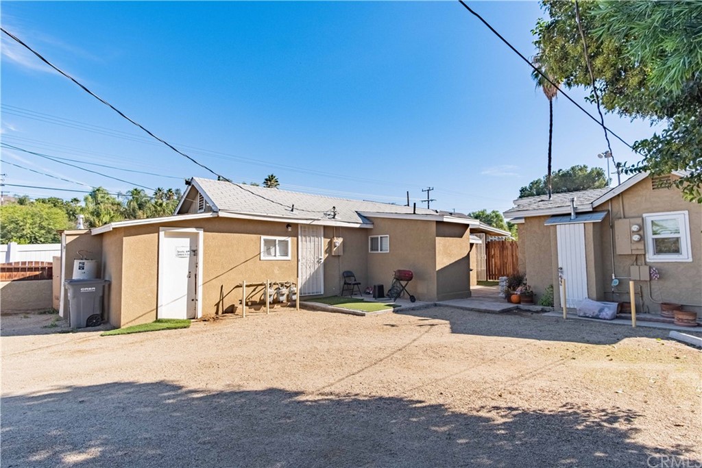 306 South Spring Street Lake Elsinore, CA 92530 - Photo 1 of 1 a front view of a house with a yard covered in snow