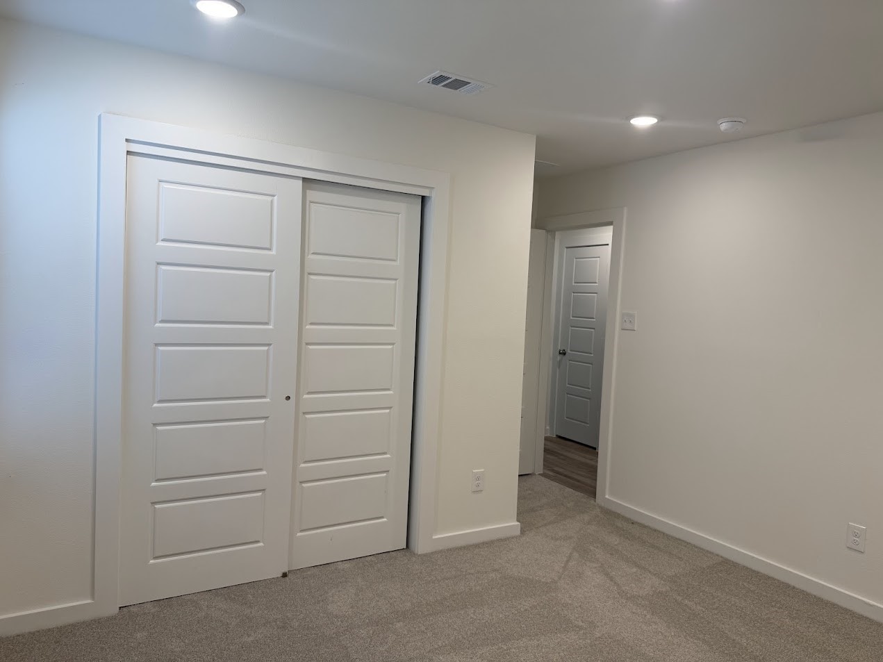 3134 Emerald Hls Drive Angleton, TX 77515 - Photo 4 of 7 wooden floor in an empty room