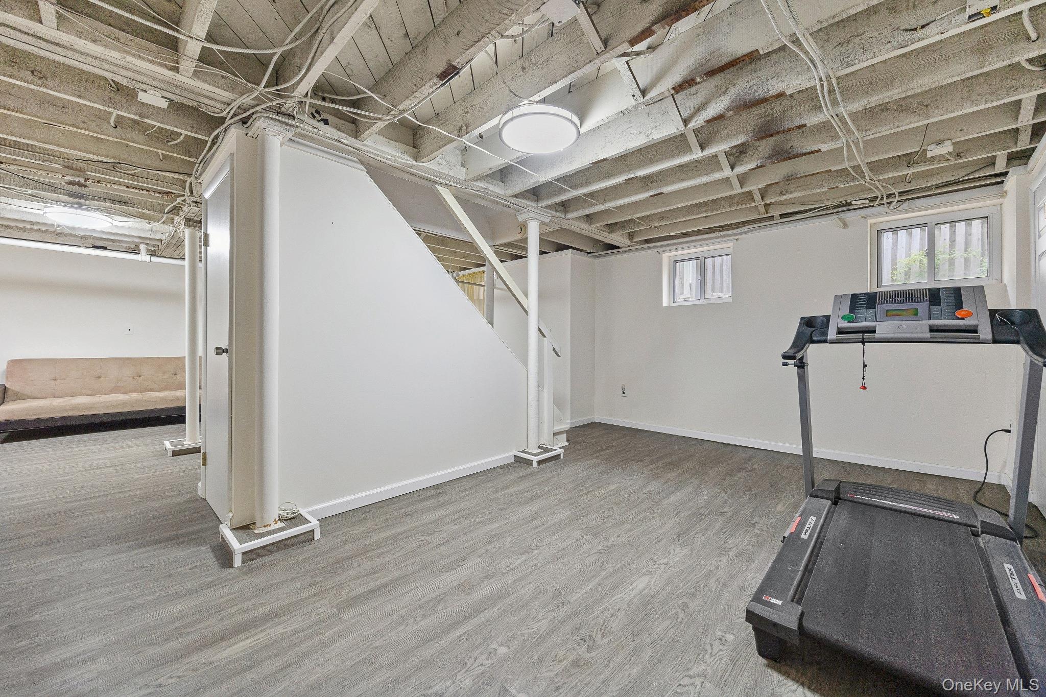 1235 Post Road Scarsdale, NY 10583 - Photo 29 of 30 Exercise room with wood finished floors and baseboards