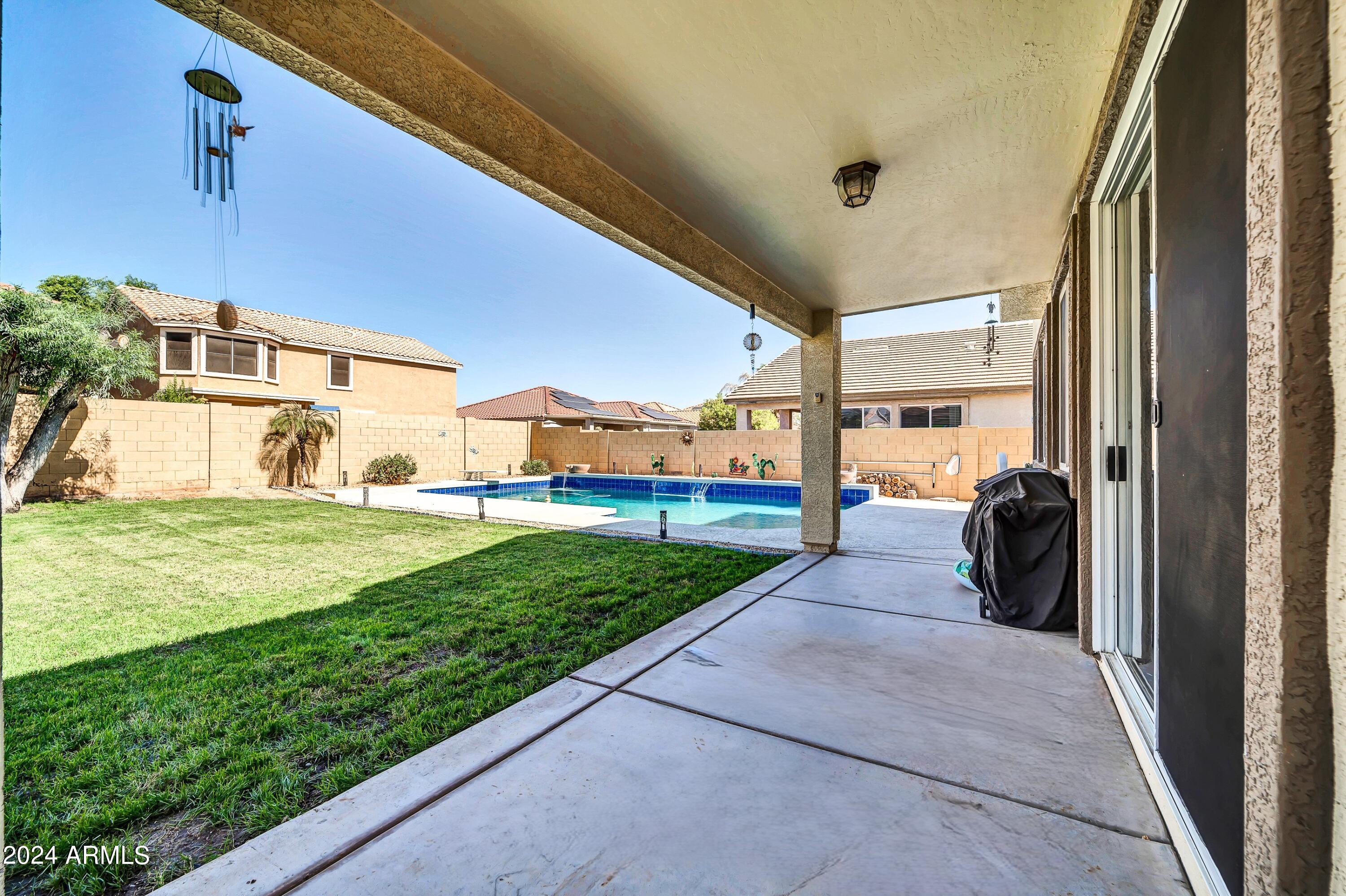 14988 West Bloomfield Road Surprise, AZ 85379 - Photo 27 of 34 Back covered patio - bloomfield