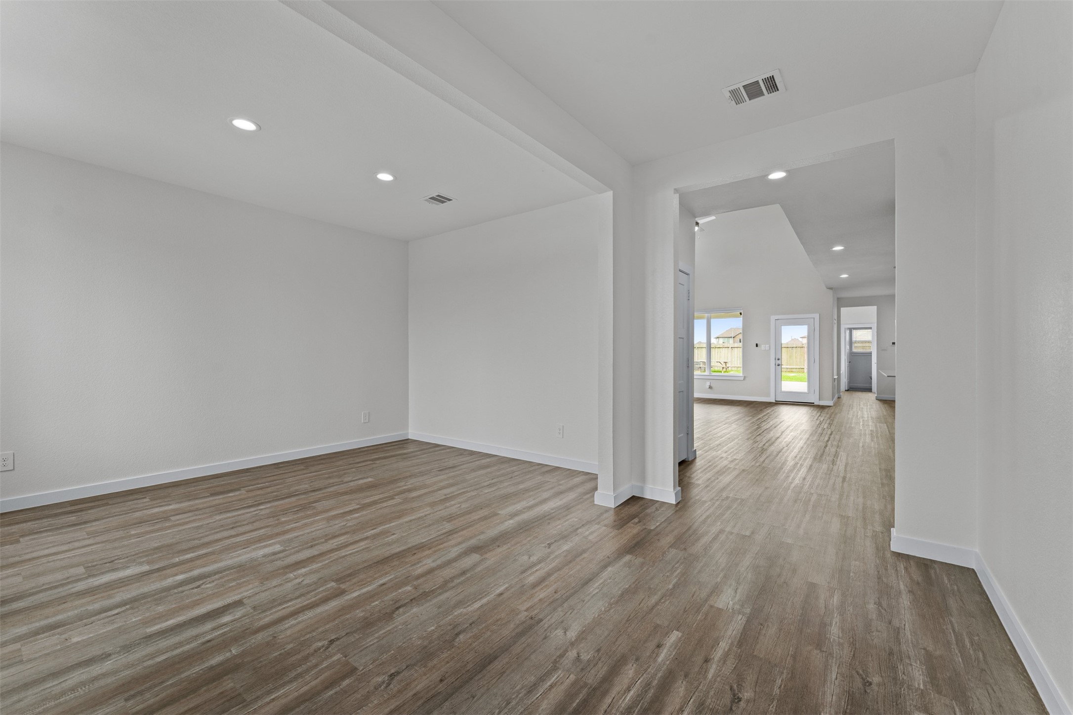 22503 Modica Rift Lane Katy, TX 77449 - Photo 47 of 47 a view of a hallway with wooden floor