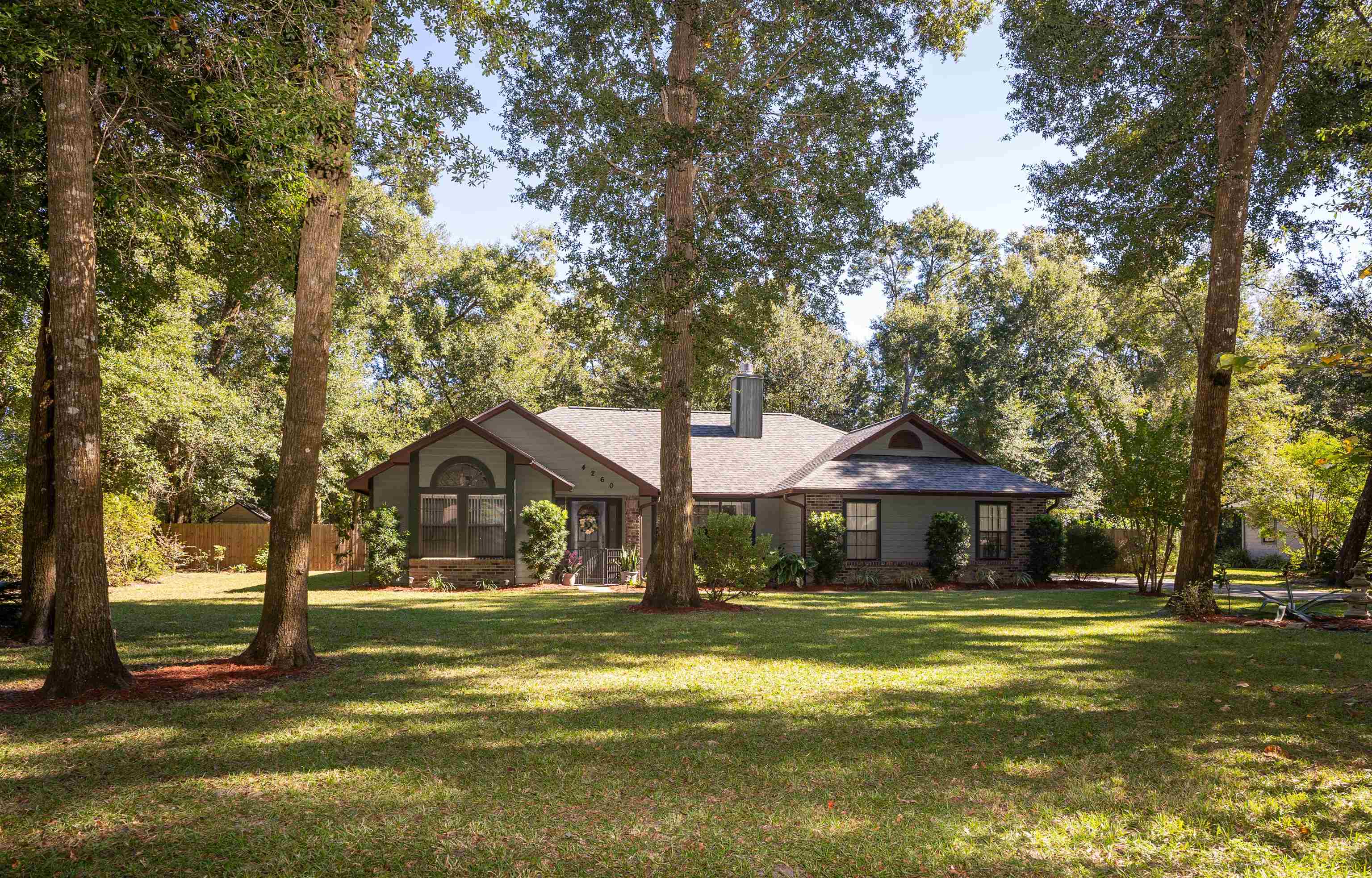 4260 Wicks Branch Road St. Augustine, FL 32086 - Photo 1 of 31 a front view of a house with a yard