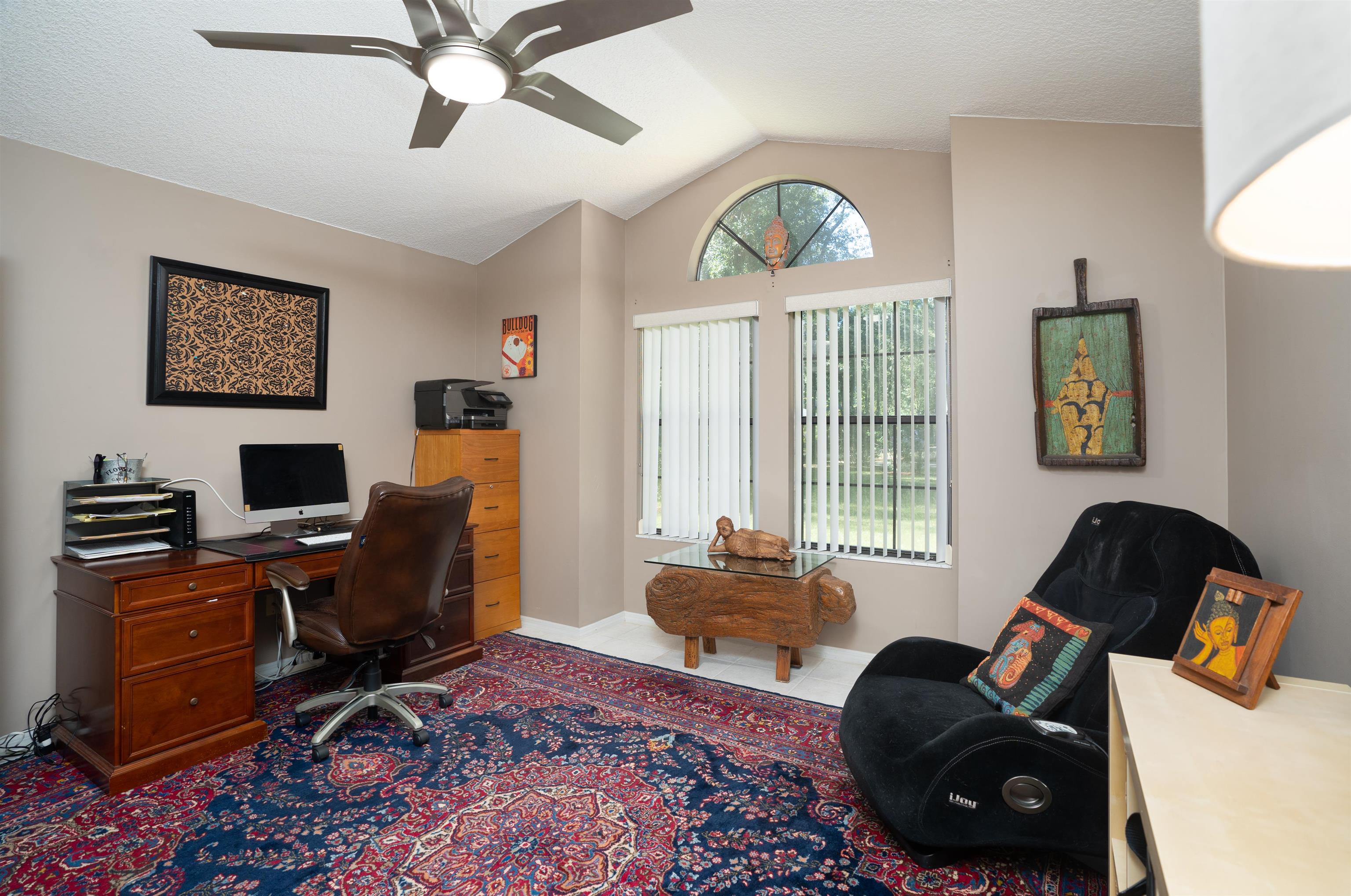 4260 Wicks Branch Road St. Augustine, FL 32086 - Photo 22 of 31 a livingroom with workspace and a window