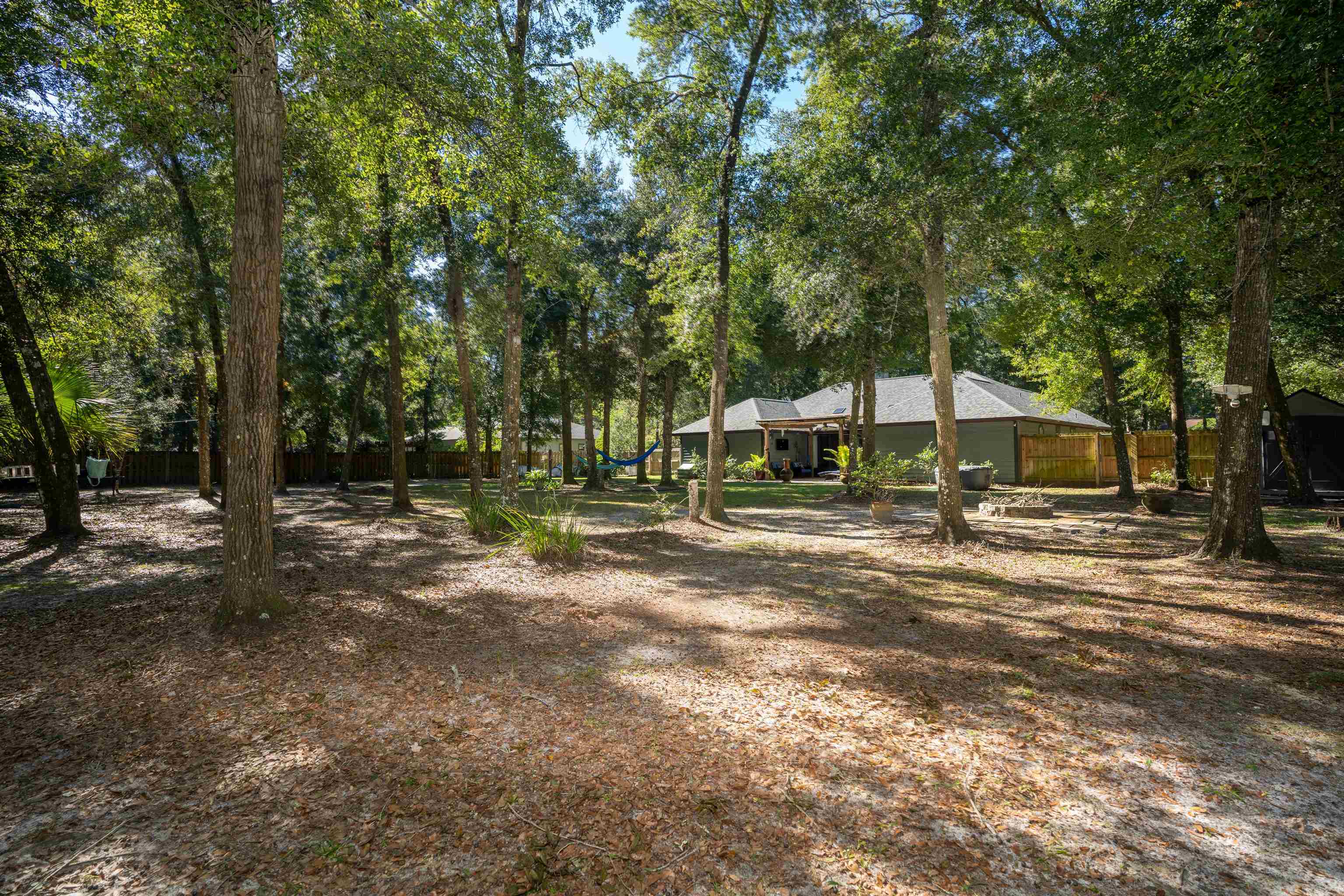 4260 Wicks Branch Road St. Augustine, FL 32086 - Photo 27 of 31 a view of a house with a yard