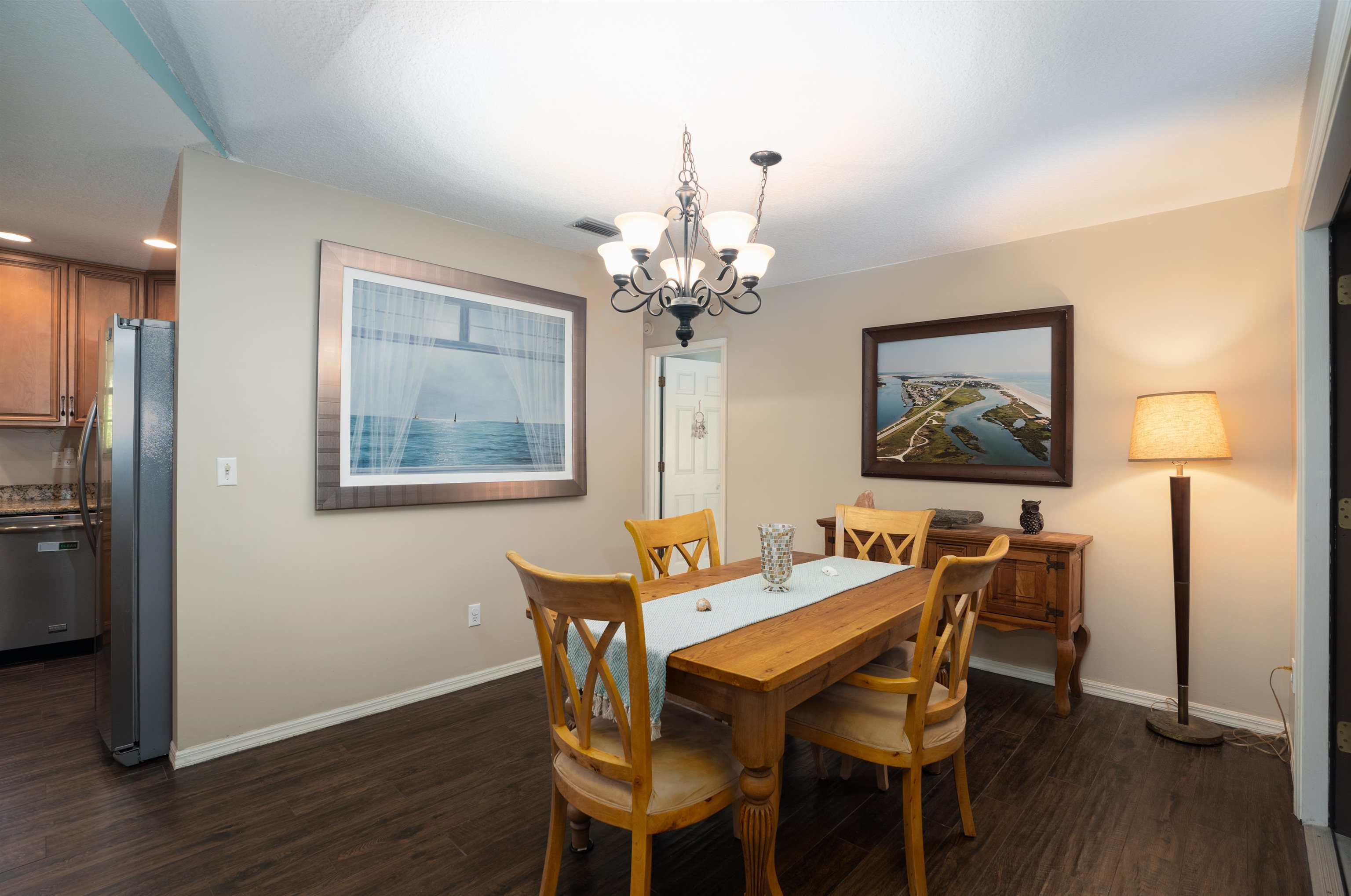 4260 Wicks Branch Road St. Augustine, FL 32086 - Photo 10 of 31 a dining room with furniture and wooden floor