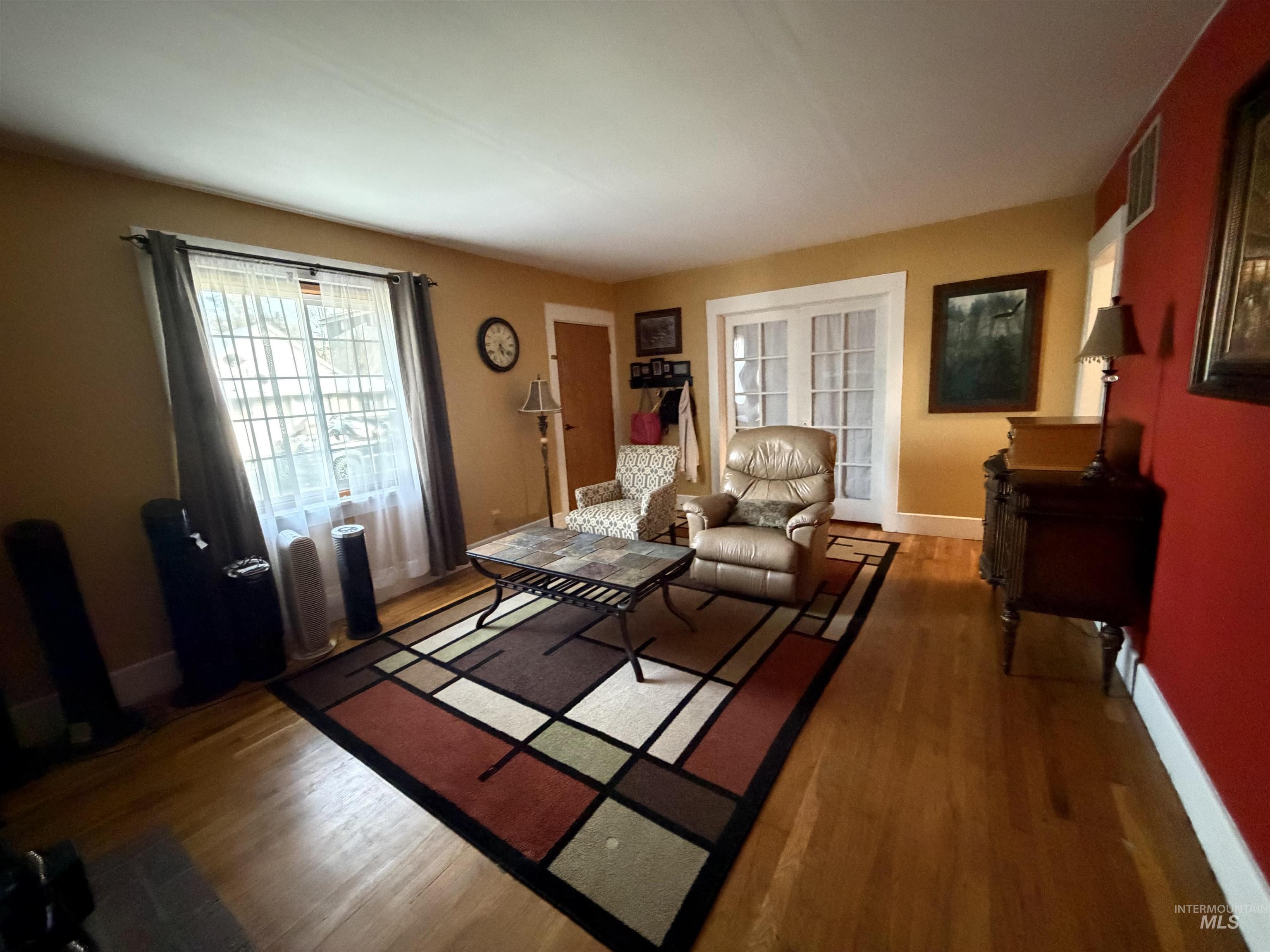 410 12th Street Lewiston, ID 83501 - Photo 11 of 38 Living room featuring wood finished floors