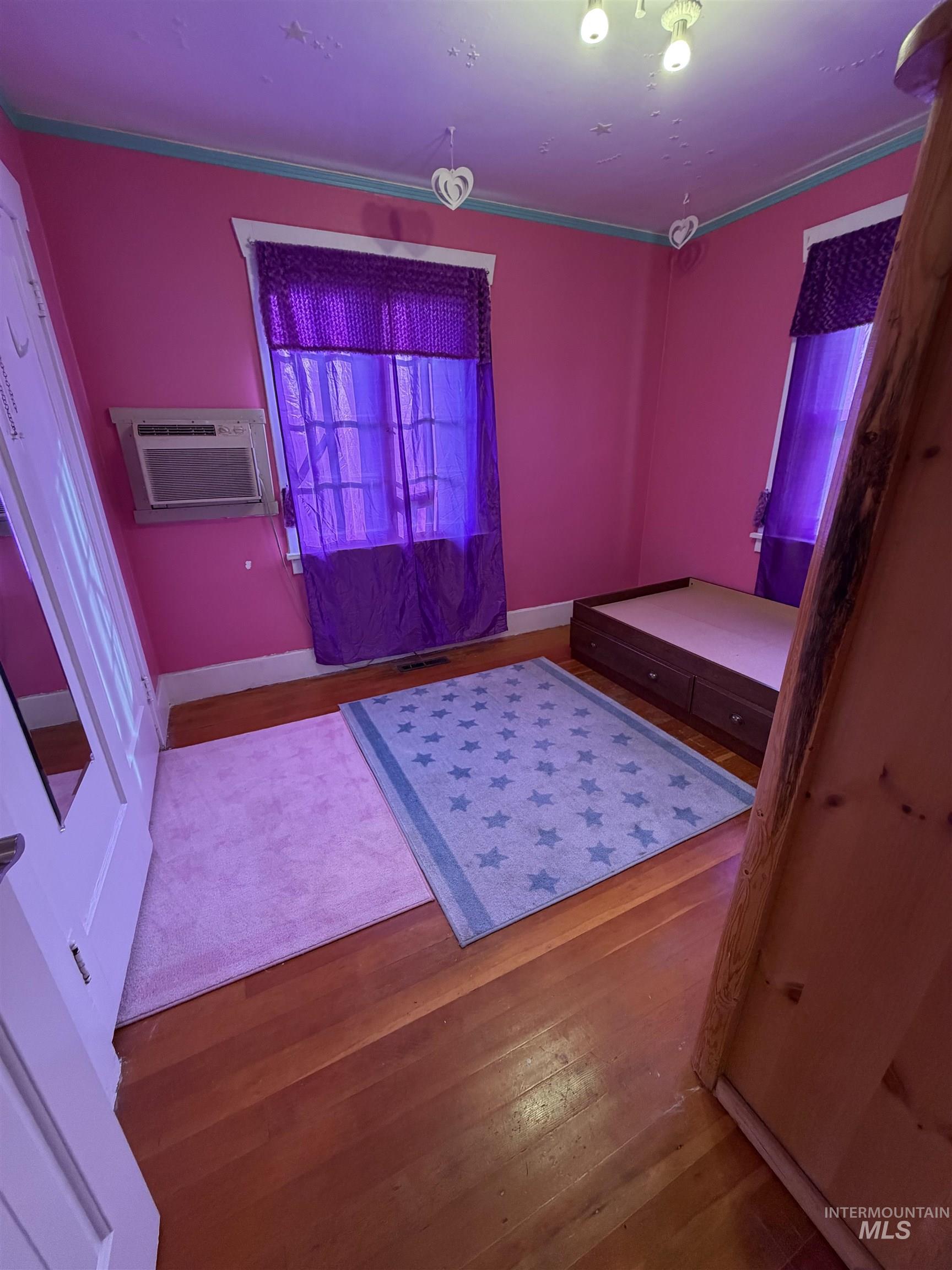 410 12th Street Lewiston, ID 83501 - Photo 15 of 38 Bedroom with wood-type flooring and baseboards